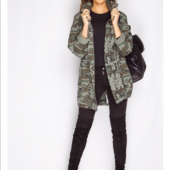 black jeans camo shirt